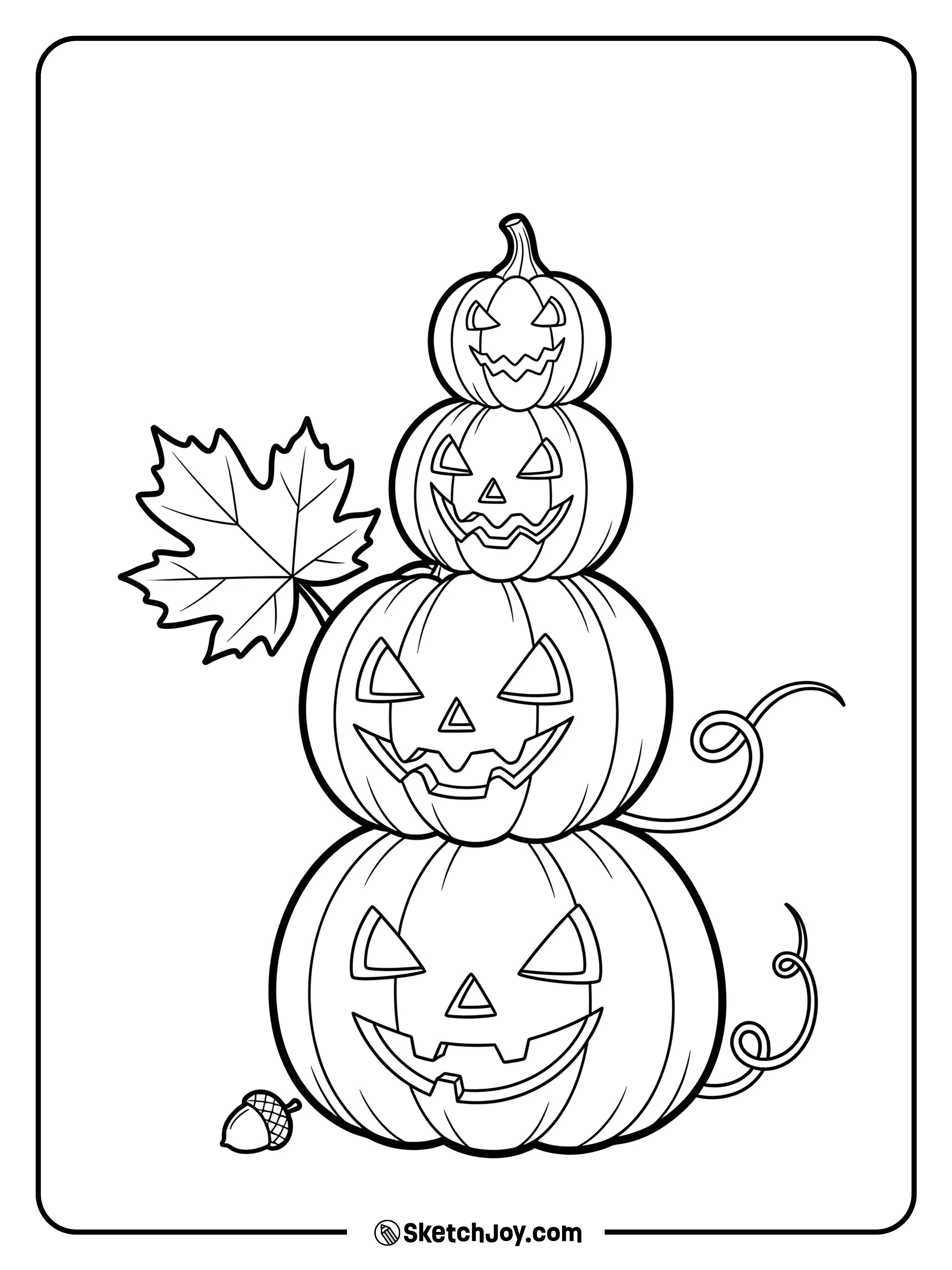 Three pumpkins of different sizes sit in a neat stack.