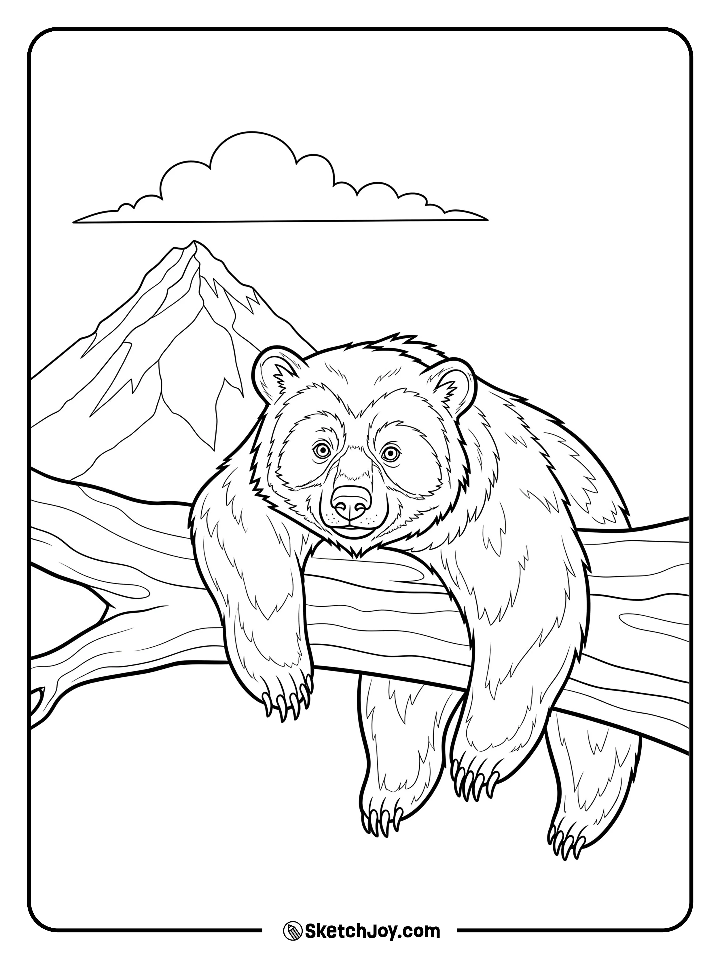 A spectacled bear lounges on a branch with distant peaks beyond.