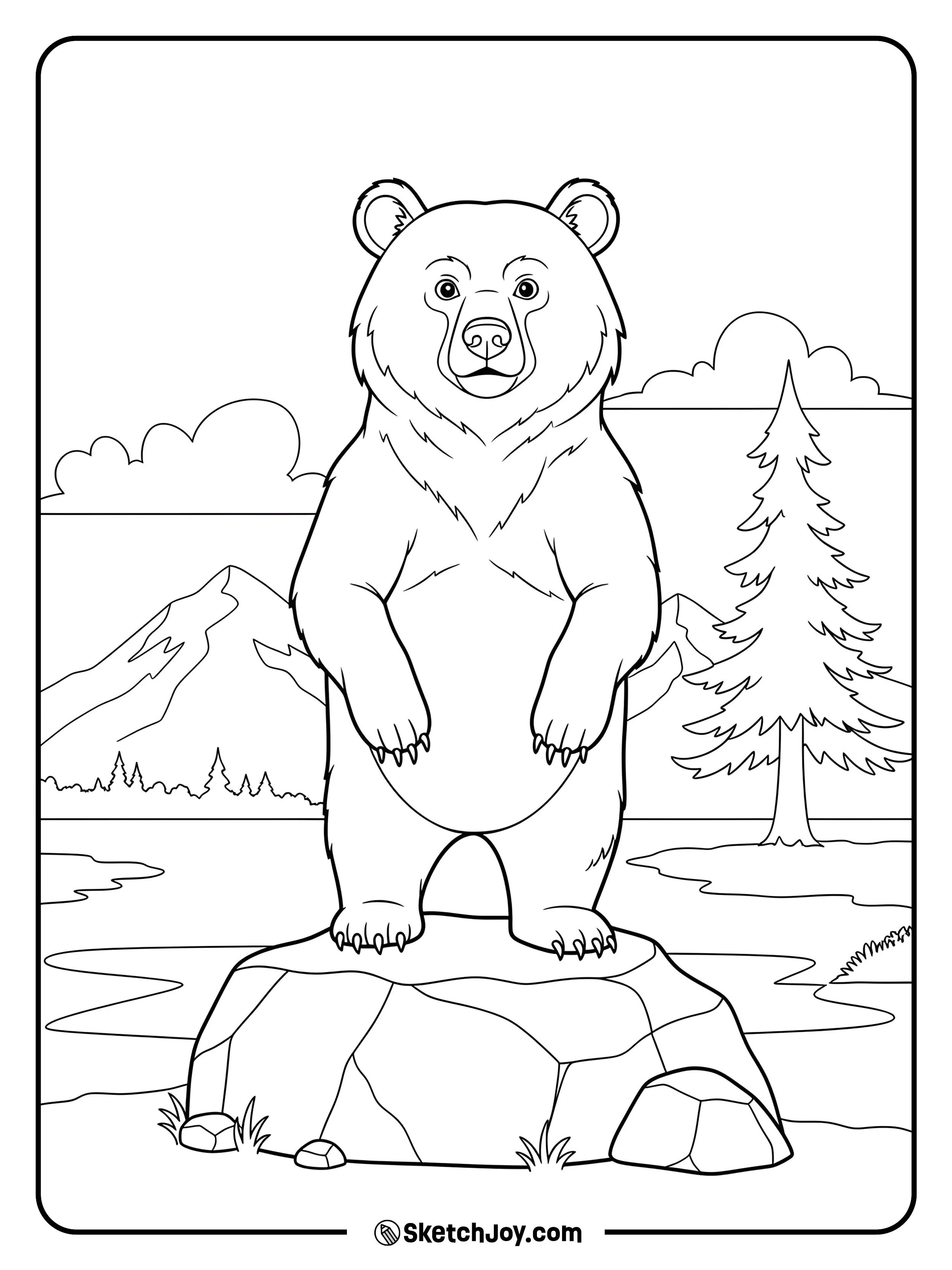 A brown bear stands tall on a rock and scans the valley.