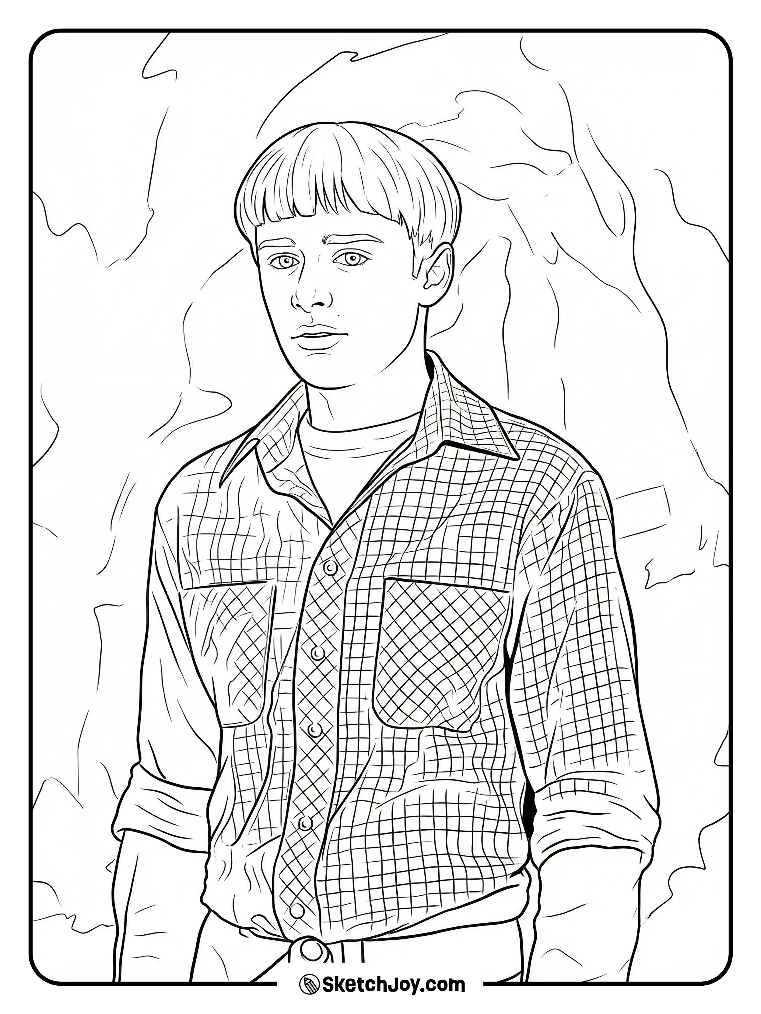 Will Byers stands in front of rough rock shapes.
