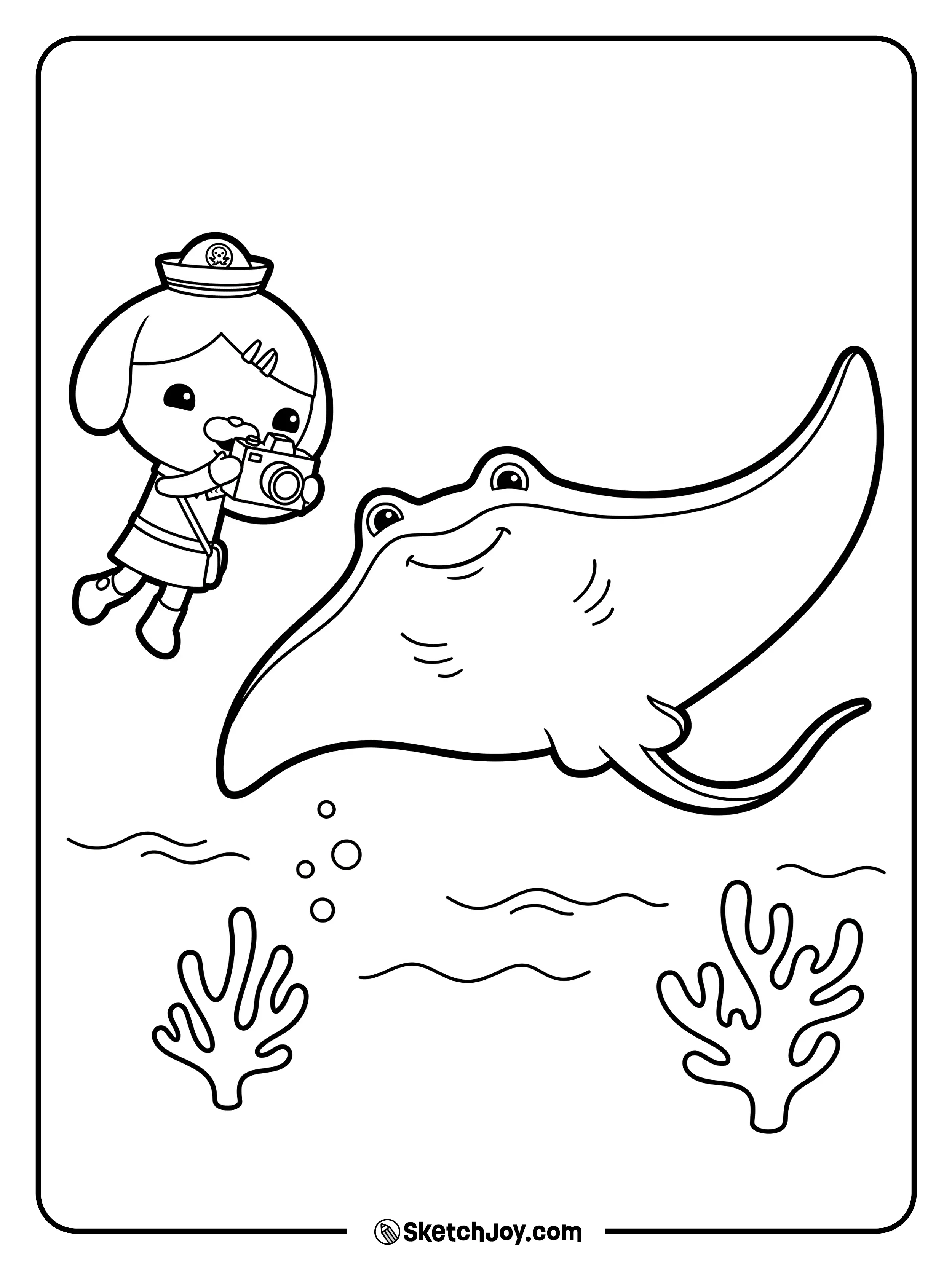 Dashi snaps a photo of a manta ray gliding by.