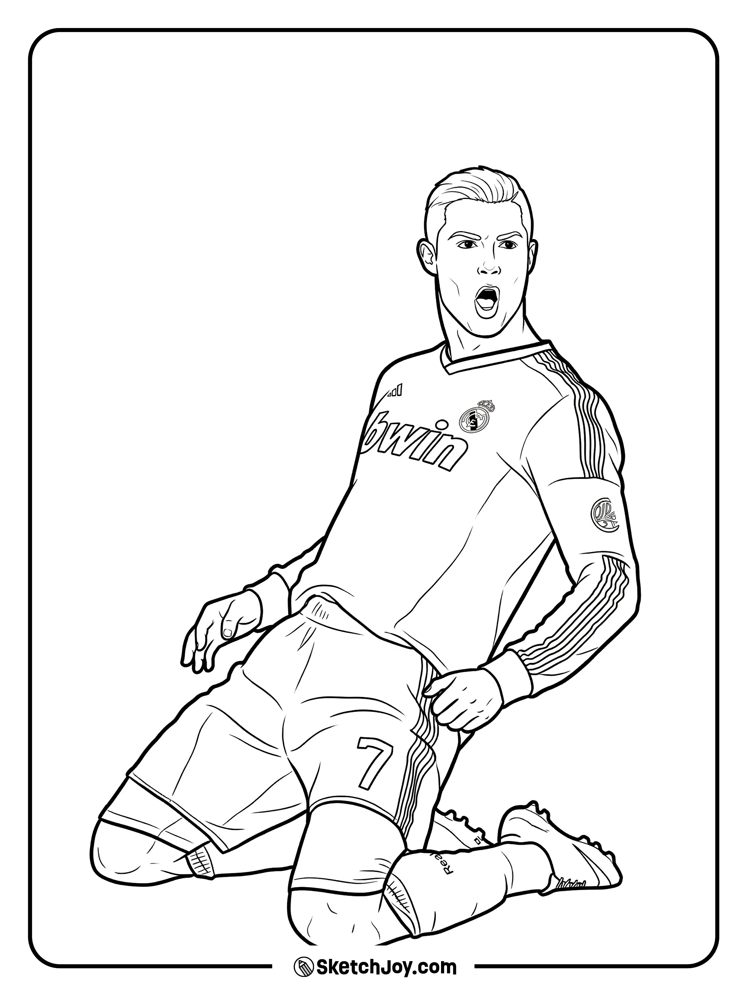 Cristiano slides on his knees after a goal in a classic pose.