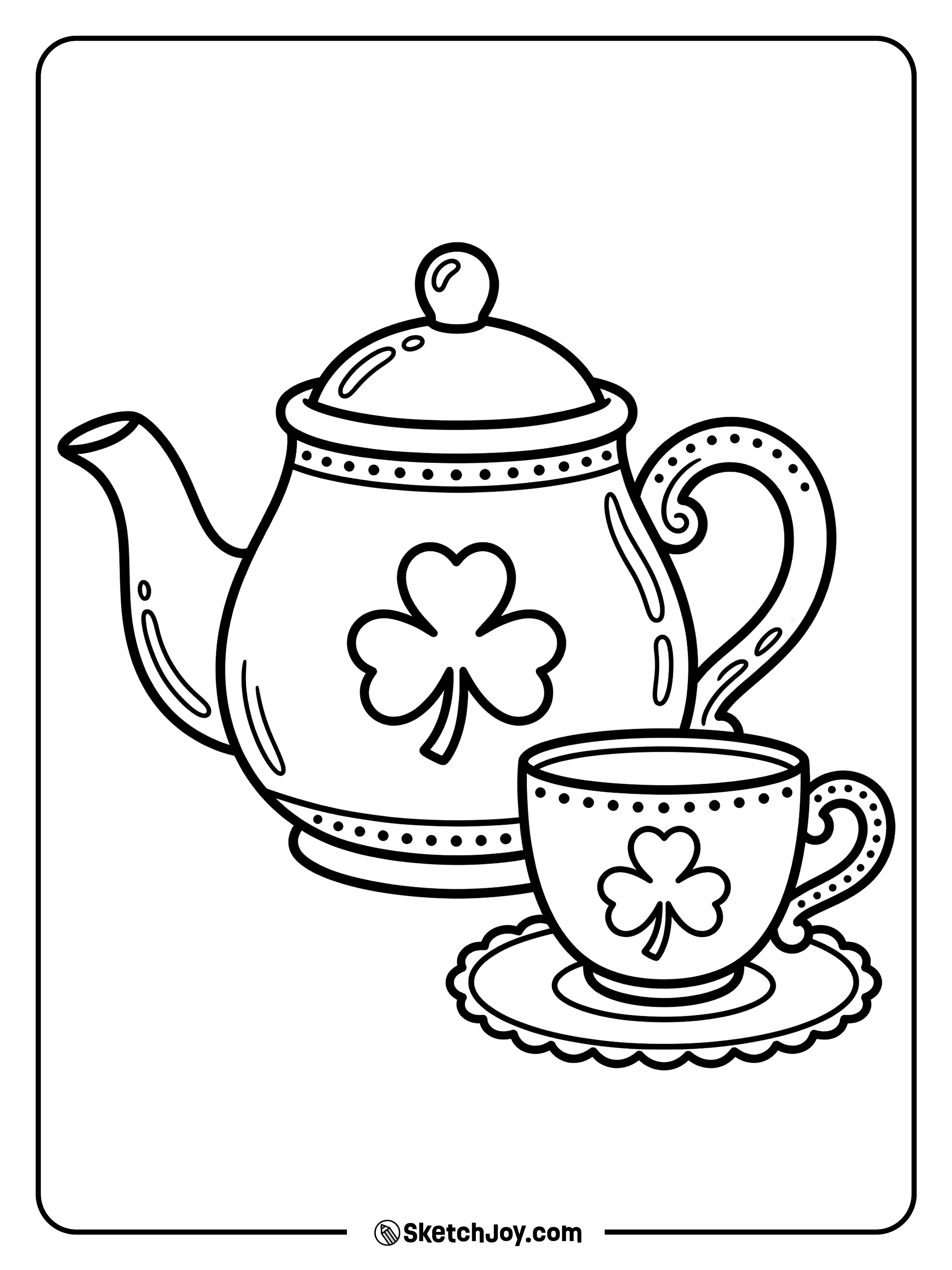A teapot and a teacup with shamrock designs sitting on a table.