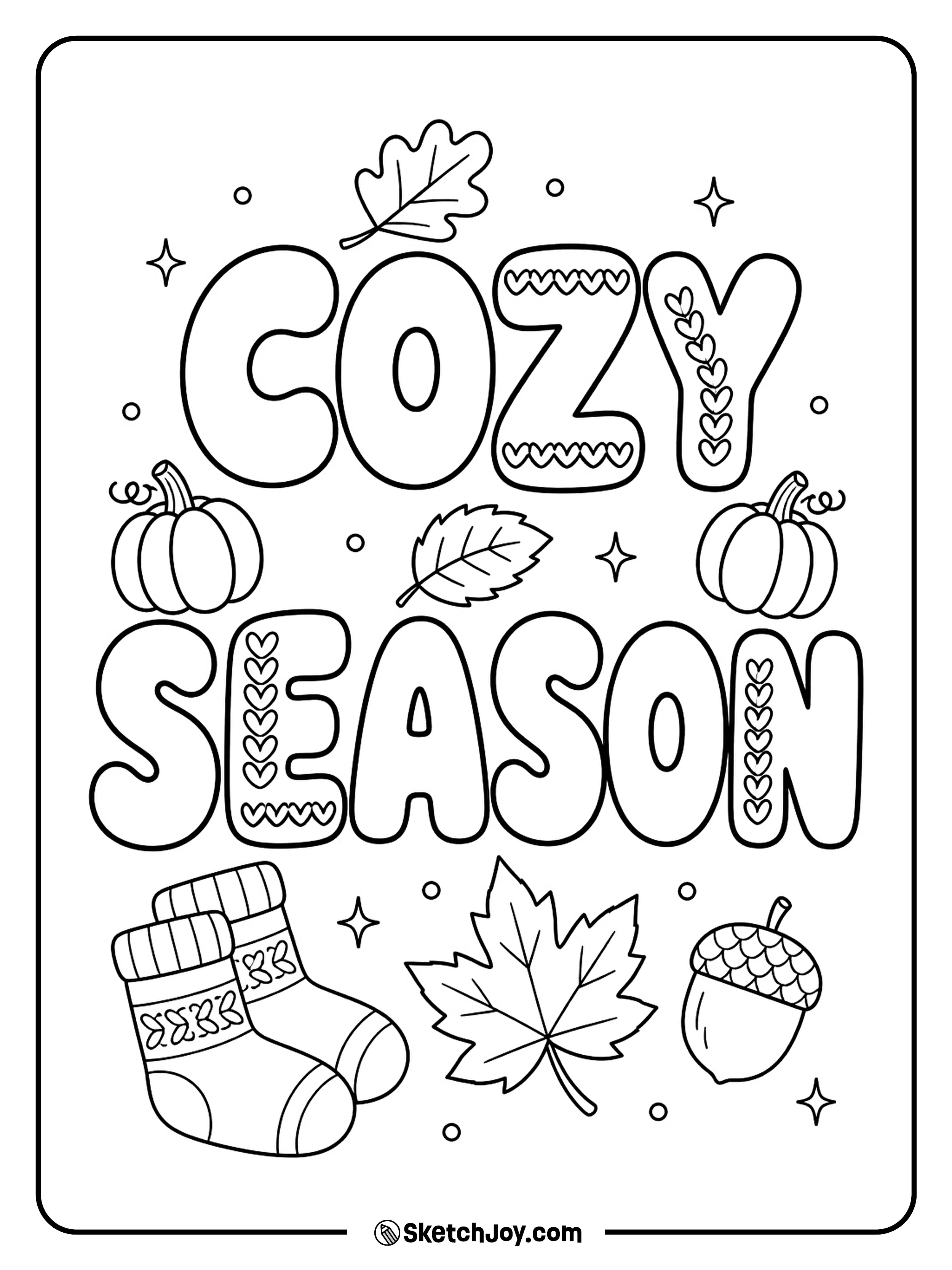 Big cozy letters are decorated with autumn leaves, socks, and tiny pumpkins.