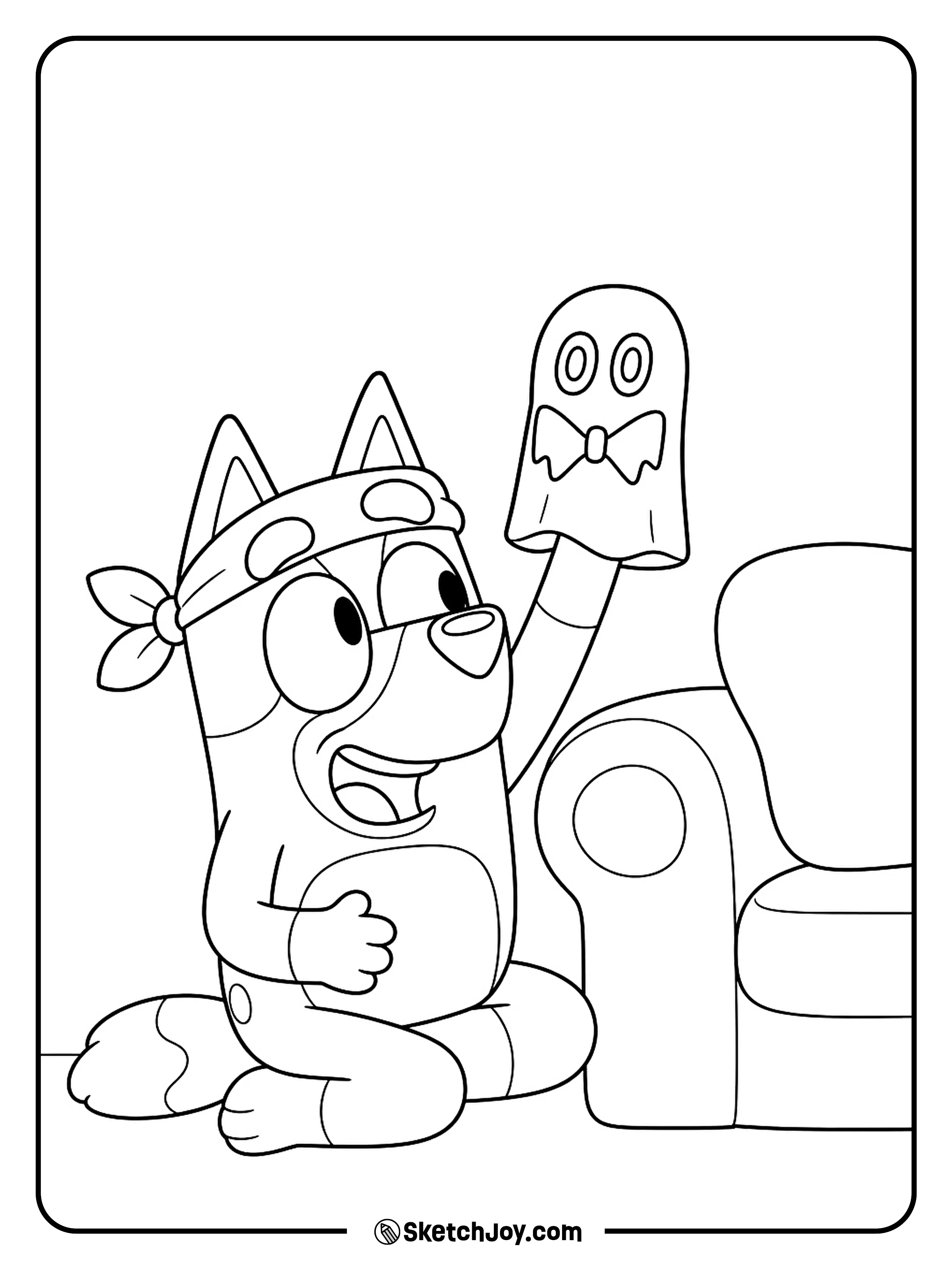 A sock puppet gives its best little boo from beside the sofa.