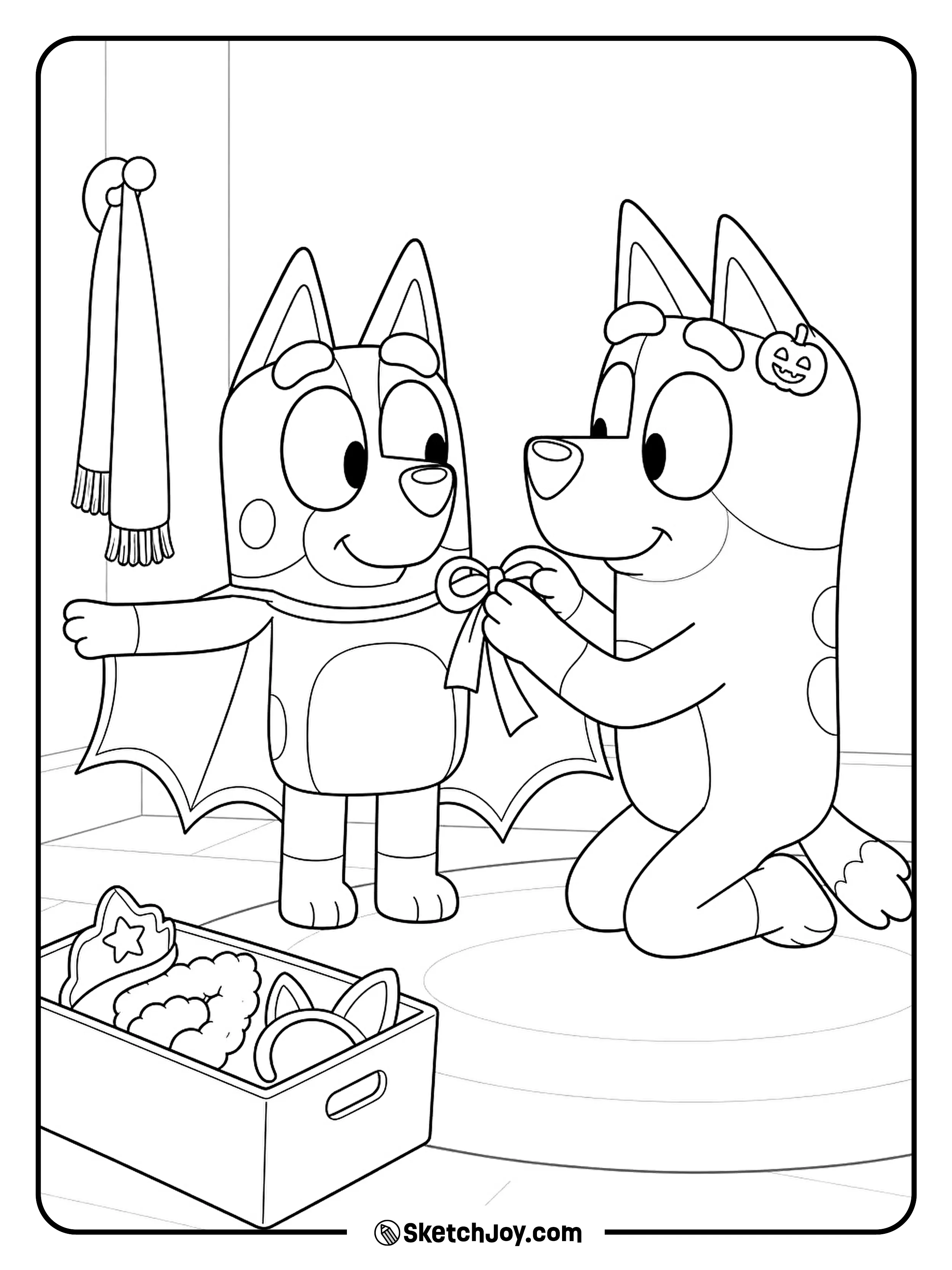 Bingo holds still while her big sister ties the final bow on her costume.